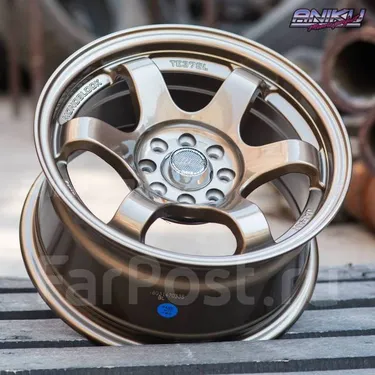 Литой диск RAYS 8570 R14 7J 4x98/4x100 ET20 dia 73.1