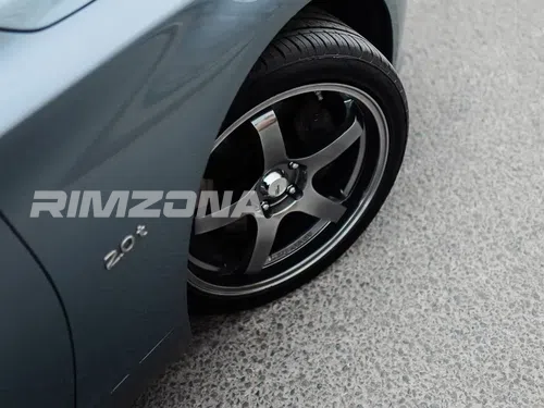 Литой диск ADVAN TC-4 R15 7J 4x100 ET30 dia 73.1 - Фото вживую на авто №6